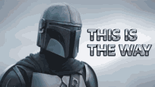a man in a helmet with the words  this is the way  behind him