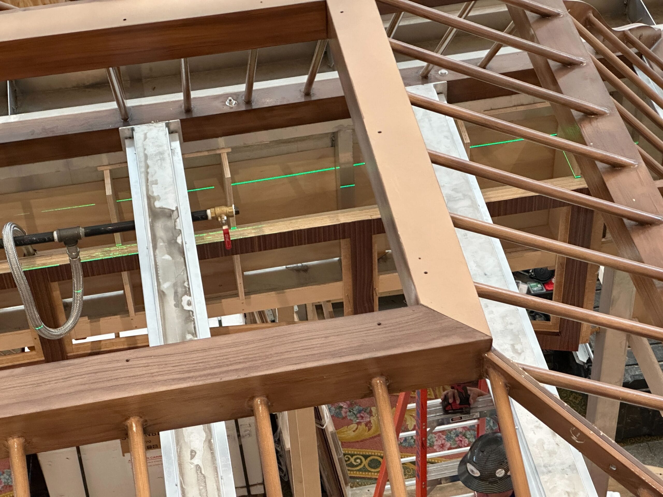 Wooden and metal framework under construction for new light fixtures at Disney lobby, Grand Floridian Resort.
