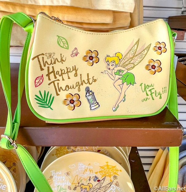 think-happy-thoughts-tinker-bell-crossbody-peter-pan-collection-uk-pavilion-epcot-2022-wdw-walt-disney-world-606x625.jpg