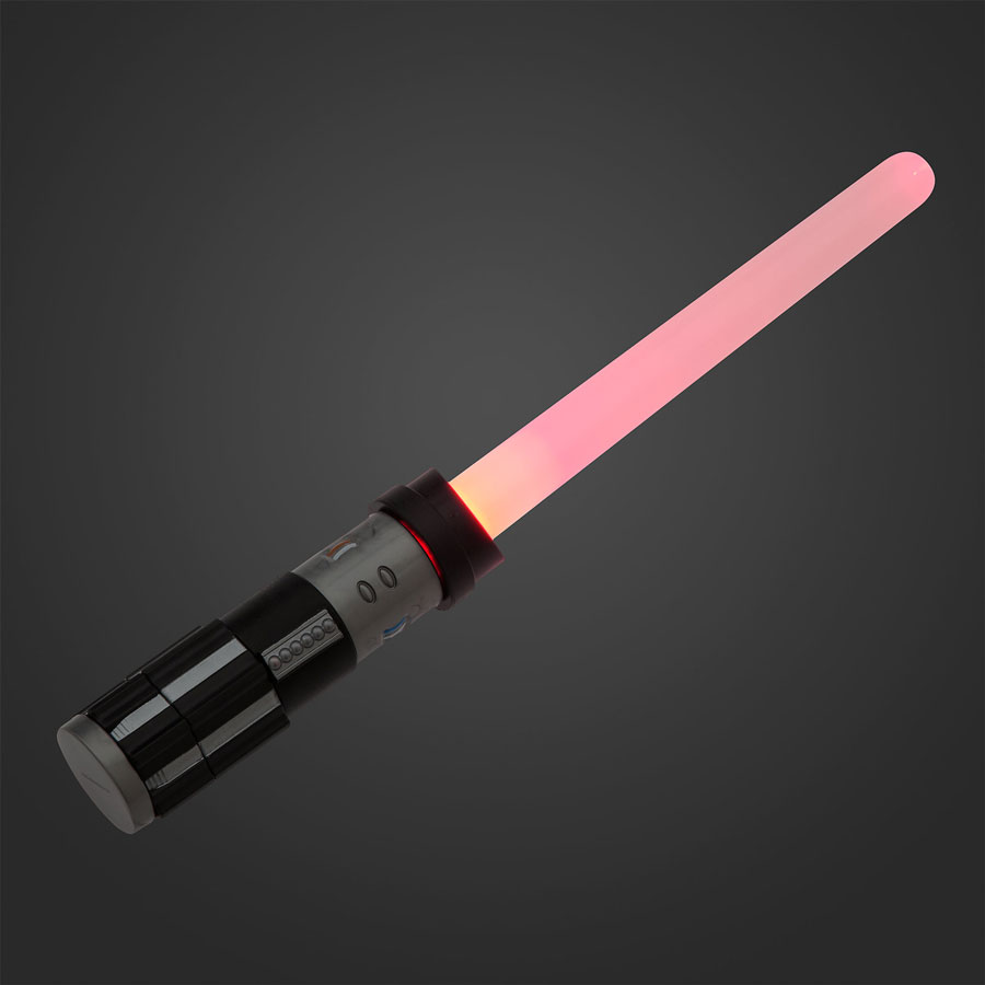Lightsaber toy build kit — complete with mix-and-match hilt pieces and a light-up feature