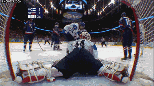 hockey-ref-takes-out-player.gif