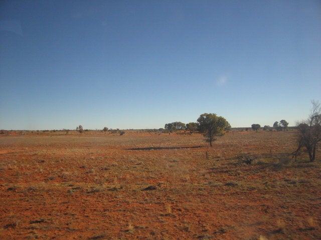 a3358444-54-A_view_out_the_window_of_the_coach_at_the_Central_Australian_Outback.sized.jpg
