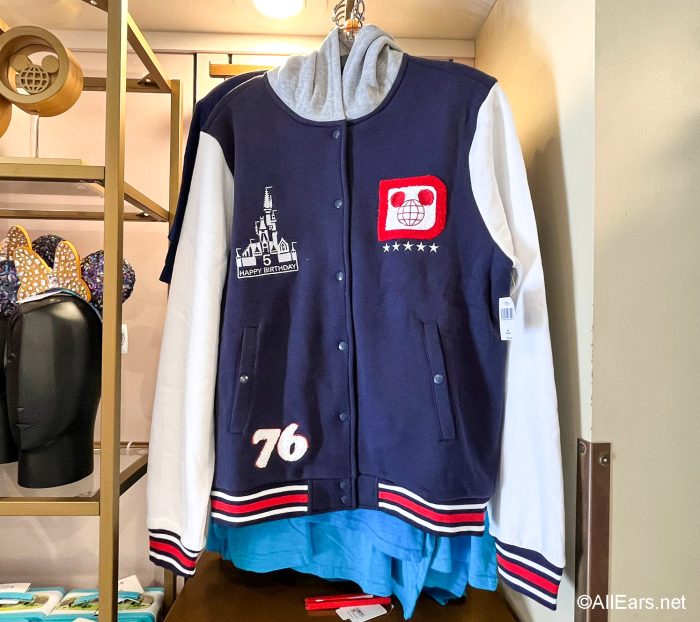 2022-wdw-dhs-celebrity-5-and-10-america-on-parade-varsity-jacket-1-700x622.jpg