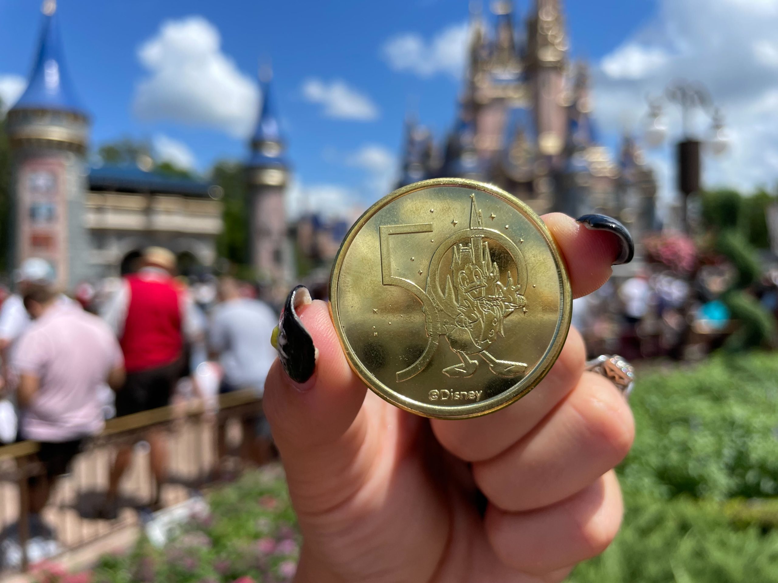 New MK emporium 50th anniversary collectible medallion designs castle scaled New MK emporium 50th anniversary collectible medallion designs castle scaled