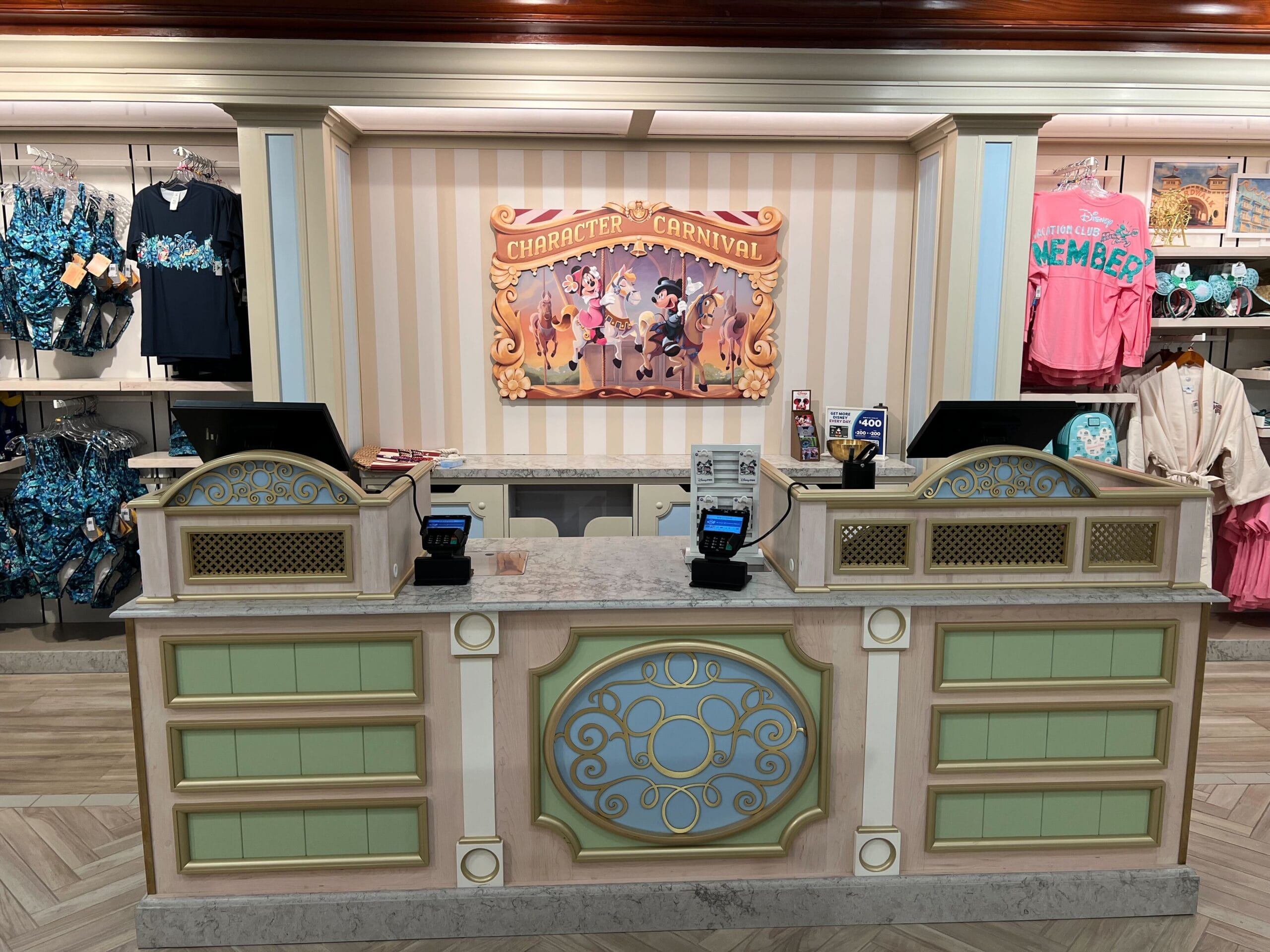 A themed checkout counter at Screen Door General Store, with merchandise and a Character Carnival sign on the wall. A themed checkout counter at Screen Door General Store, with merchandise and a Character Carnival sign on the wall.