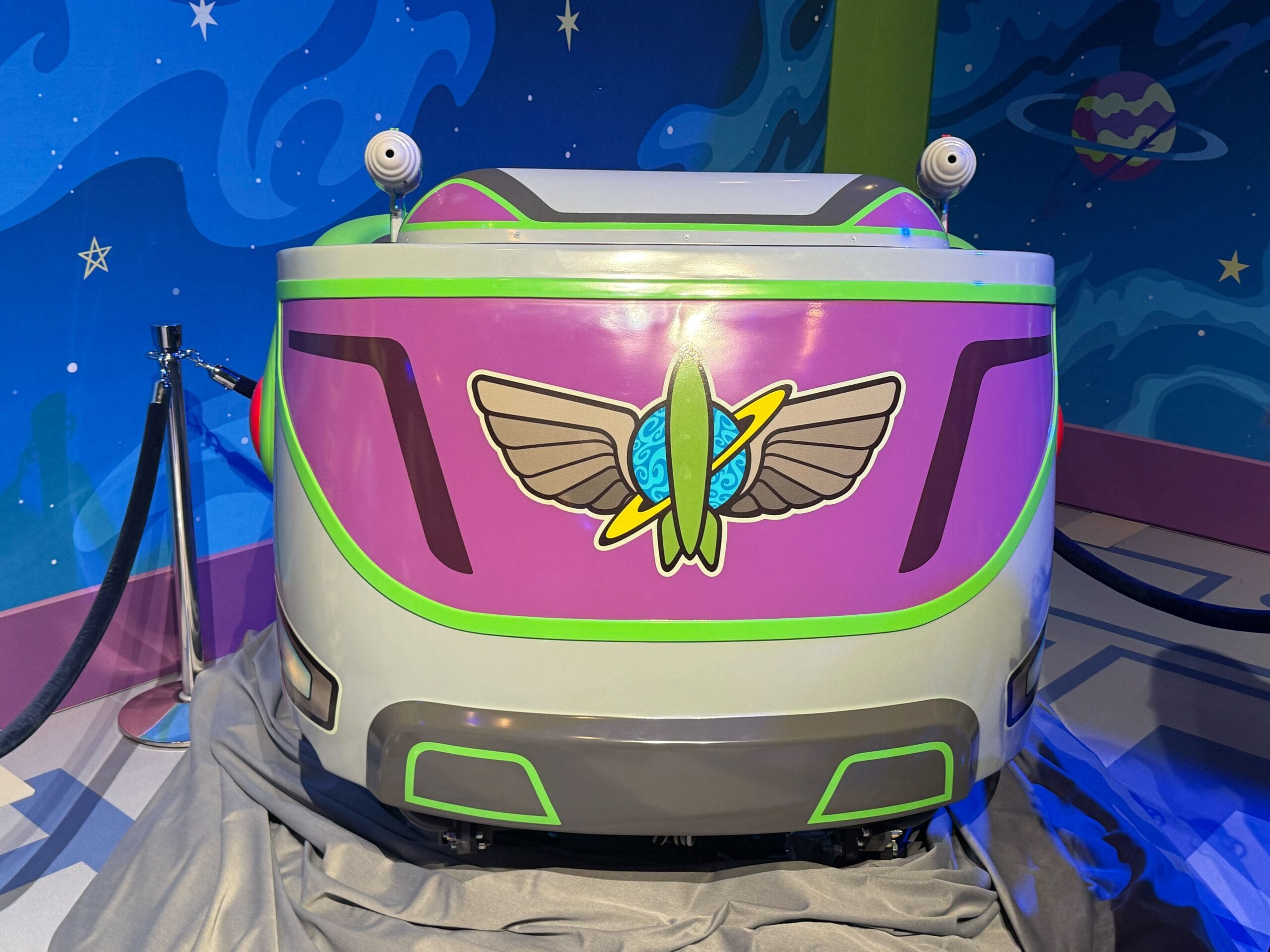 First look at colorful new ride vehicles with a rocket and wings, set in a Buzz Lightyear Space Ranger Spin-inspired space scene. First look at colorful new ride vehicles with a rocket and wings, set in a Buzz Lightyear Space Ranger Spin-inspired space scene.