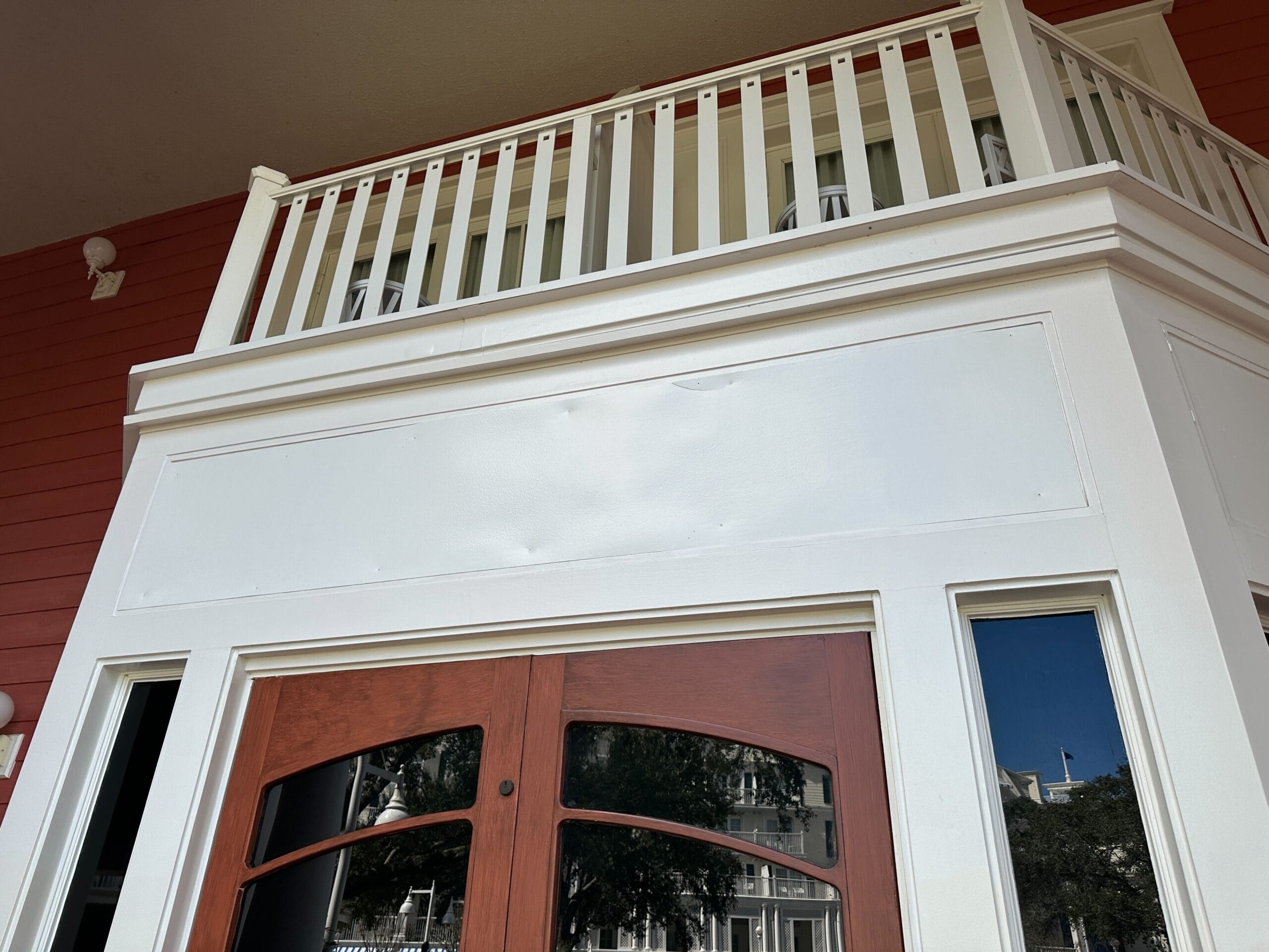 White and red exterior with wooden door and big windows—once Promenade Fine Art Gallery at Disney’s BoardWalk Resort (now closed). White and red exterior with wooden door and big windows—once Promenade Fine Art Gallery at Disney’s BoardWalk Resort (now closed).