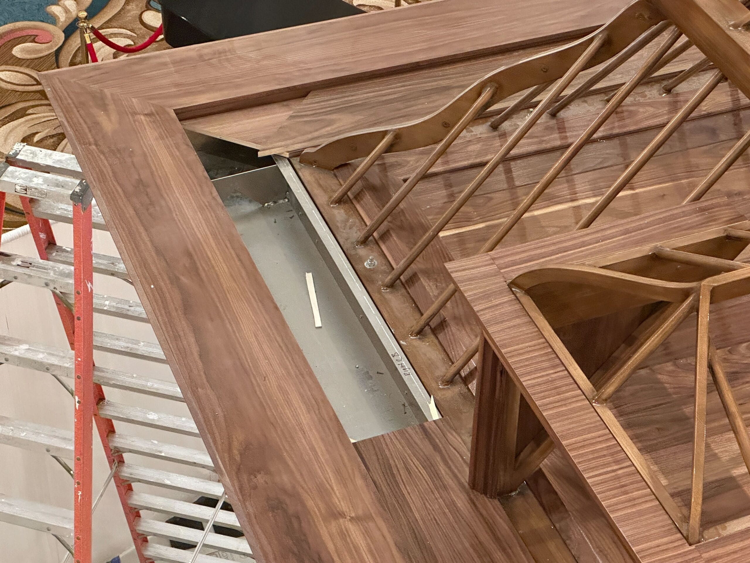 Close-up of wooden framework being built near a metal ladder at Grand Floridian Bar lobby, Walt Disney World resort renovation. Close-up of wooden framework being built near a metal ladder at Grand Floridian Bar lobby, Walt Disney World resort renovation.