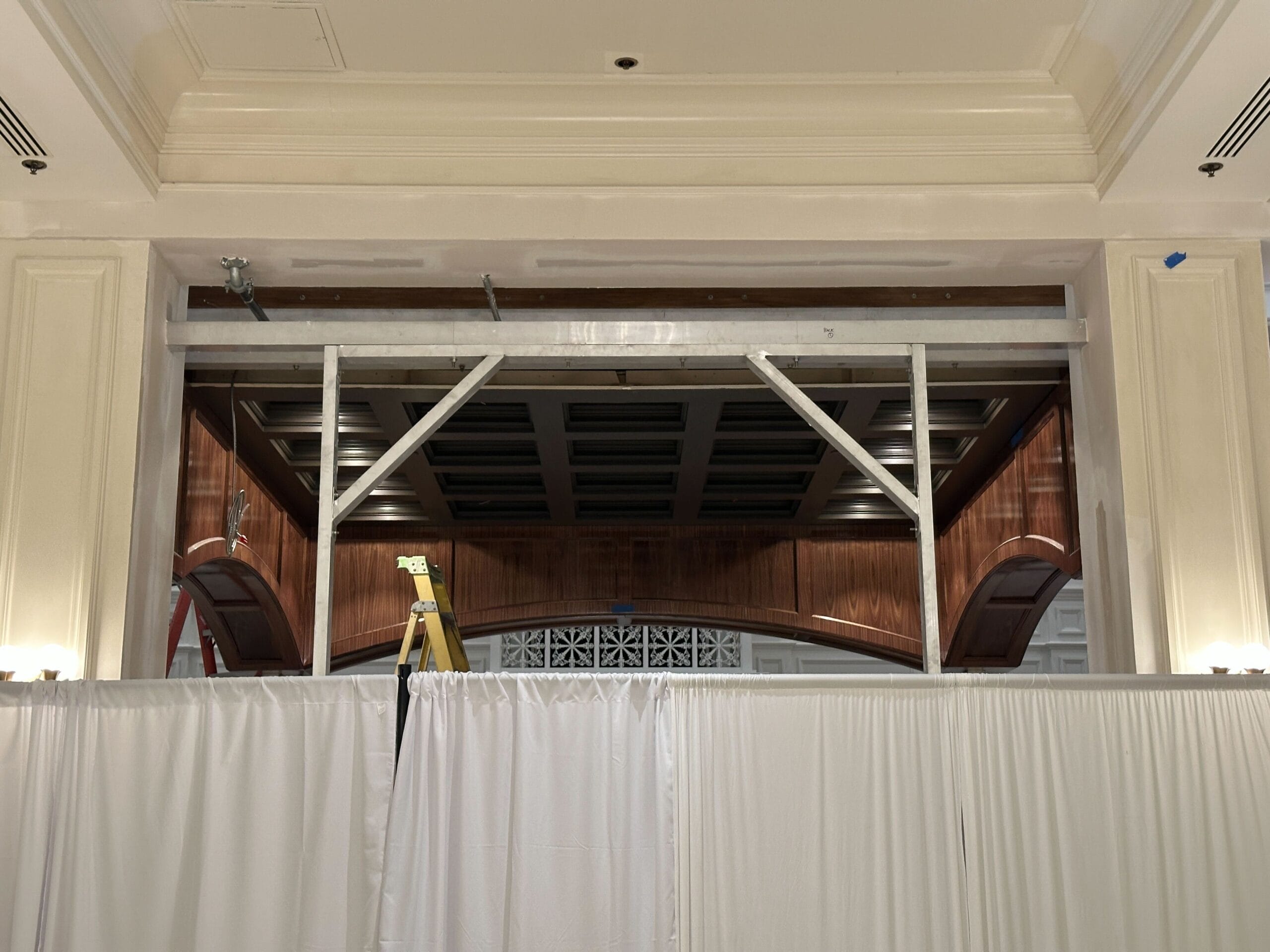 White-curtained barriers hide refurbishments in the lobby of Disney's Grand Floridian Resort. White-curtained barriers hide refurbishments in the lobby of Disney's Grand Floridian Resort.
