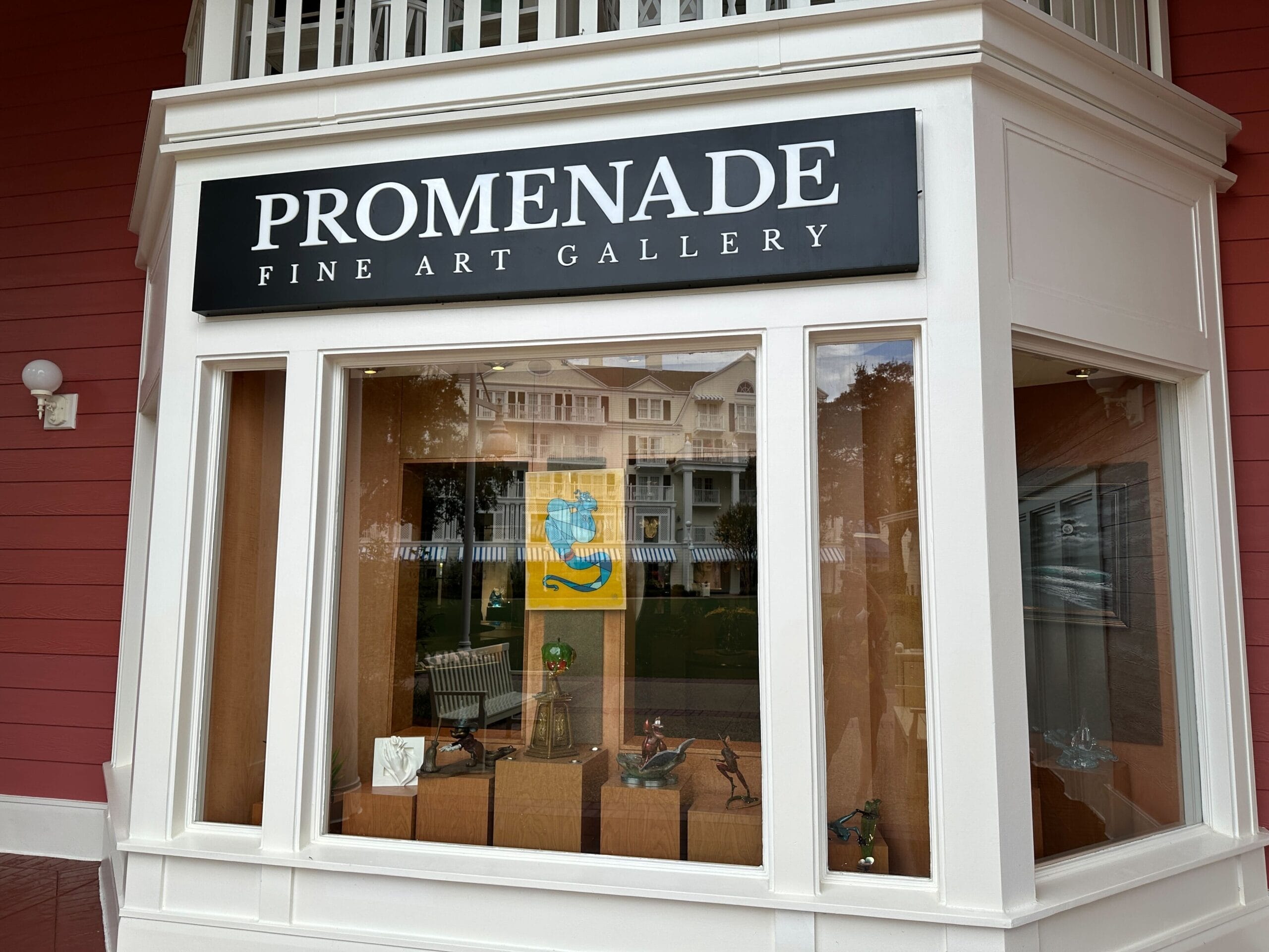 Promenade Fine Art Gallery window at Disney’s BoardWalk Resort, sign visible above closed entrance. No castle in this scene. Promenade Fine Art Gallery window at Disney’s BoardWalk Resort, sign visible above closed entrance. No castle in this scene.