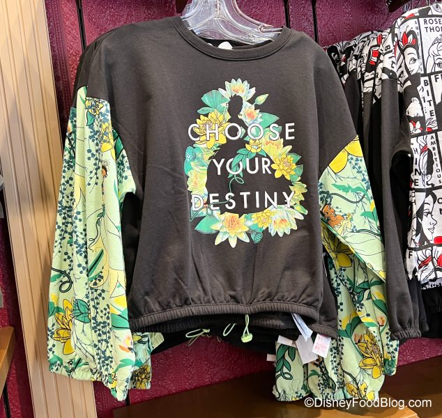 2022-dlr-disneyland-disney-showcase-tiana-princess-and-the-frog-sweatshirt-choose-your-destiny-634x600.jpg