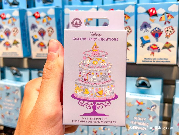 2022-dlr-downtown-disney-acron-gifts-and-goods-store-disney-world-of-disney-store-custom-cake-creations-mystery-pin-set-700x528.jpg