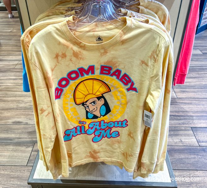 2022-dlr-downtown-disney-acron-gifts-and-goods-store-disney-world-of-disney-store-the-emperors-new-griive-boom-baby-shirt-658x600.jpg